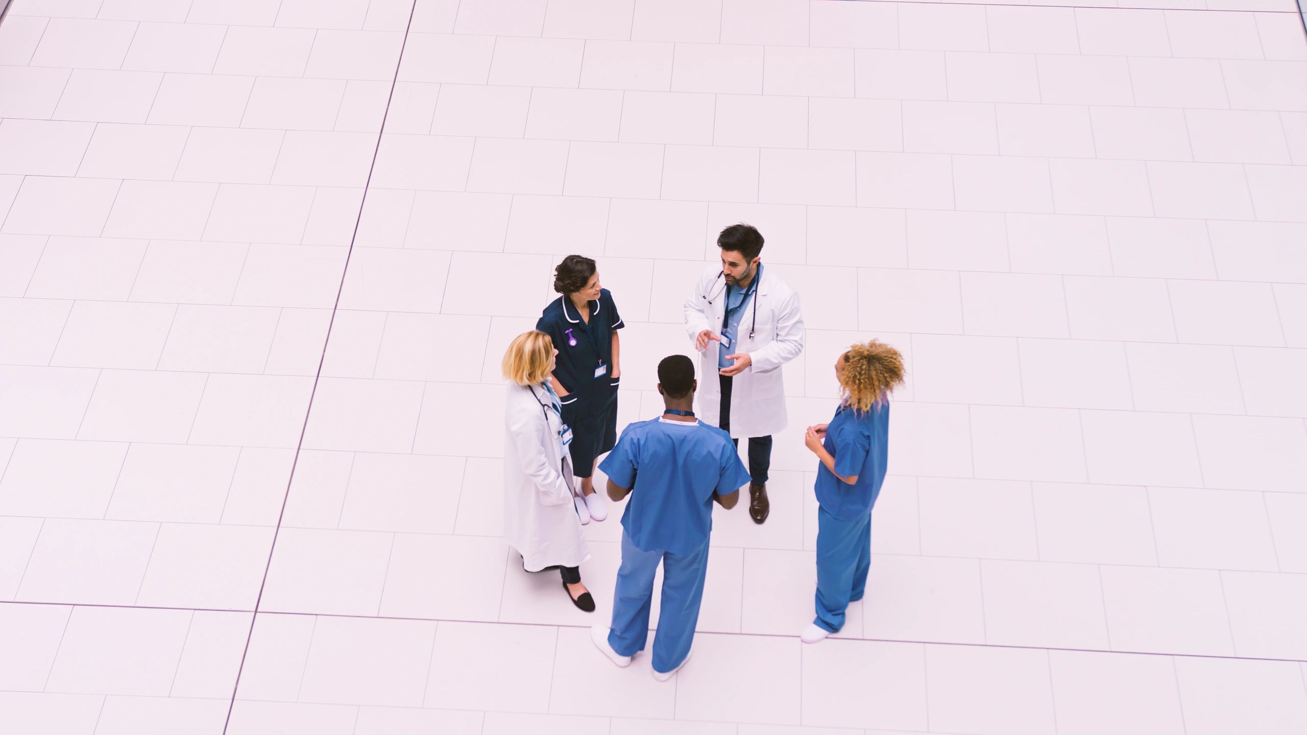 Interdisciplinary healthcare professionals in discussion
